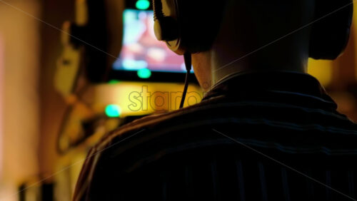 Video - Man filming with professional camera on the backstage of a TV set