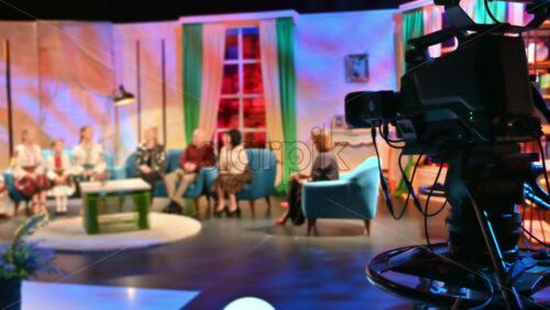 Video - Professional television camera shooting a talk show in a studio. Video production backstage