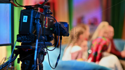 Video - Professional television camera shooting a talk show in a studio. Video production backstage