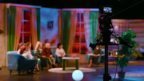 Video - Professional television camera shooting a talk show in a studio. Video production backstage