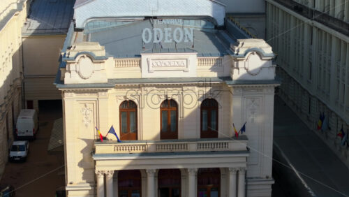Video - Bucharest, Romania - March 03, 2024: Aerial drone view of Odeon theater in the sunlight