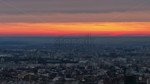 Video - Aerial drone view of Bucharest cityscape at the sunset, Romania