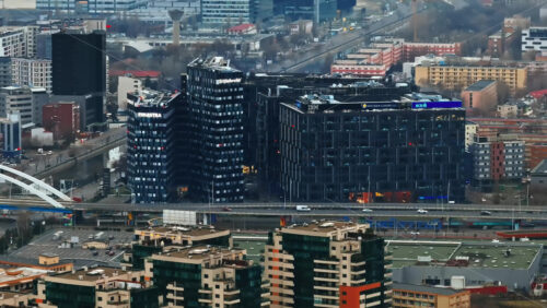 Video - Bucharest, Romania - March 03, 2024: Aerial drone view of modern office buildings of IBM, Romanian Commercial Bank, Bitdefender, Finastra, Thales, Molson Coors