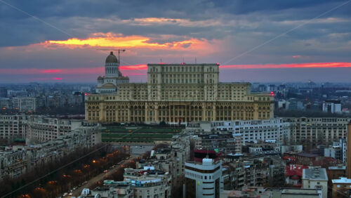 Video - Aerial drone view of Palace of the Parliament in Bucharest downtown at sunset. Romania