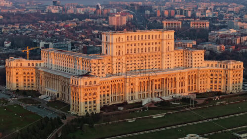 Video - Aerial drone view of Palace of the Parliament in Bucharest downtown at sunset. Romania