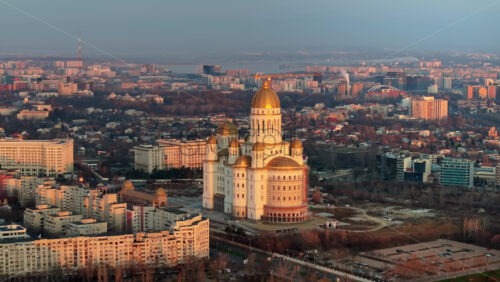 Video - Aerial drone view of People's Salvation Cathedral near the Palace of the Parliament. Sunset in Bucharest, Romania