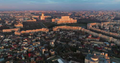 Video - Aerial drone view of Palace of the Parliament in Bucharest downtown at sunset. Romania