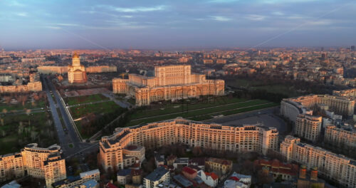 Video - Aerial drone view of Palace of the Parliament in Bucharest downtown at sunset. Romania