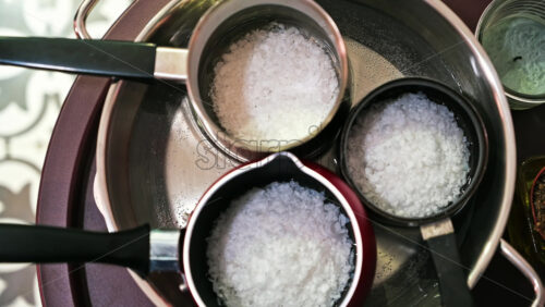 Video - Hand made candles production, melting wax in pots