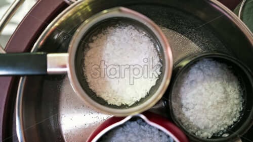 Video - Hand made candles production, melting wax in pots