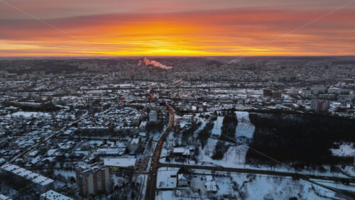 Video - Aerial drone view of Chisinau city covered in snow at sunset. Winter in Moldova