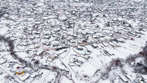 Video - Aerial drone view of Butuceni village covered in snow. Old Orhei during winter in Moldova