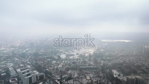 Video - Aerial drone view of Chisinau city covered in snow. Winter in Moldova