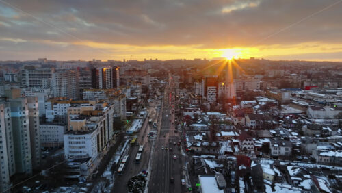 Video - Aerial drone view of Chisinau city covered in snow at sunset. Winter in Moldova