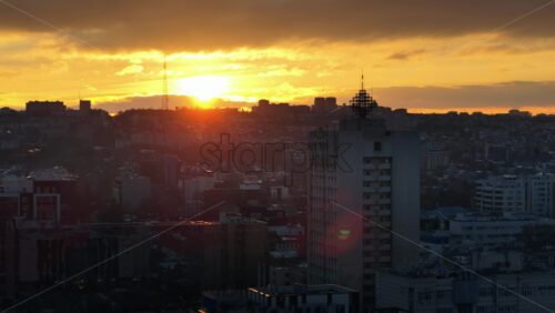 Video - Aerial drone view of Chisinau city covered in snow at sunset. Winter in Moldova