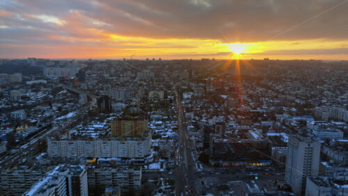 Video - Aerial drone view of Chisinau city covered in snow at sunset. Winter in Moldova
