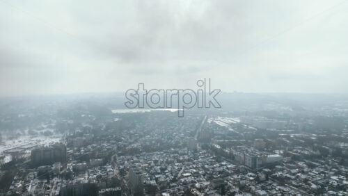Video - Aerial drone view of Chisinau city covered in snow. Winter in Moldova