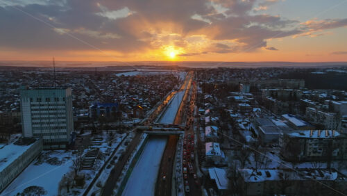 Video - Aerial drone view of Chisinau city covered in snow at sunset. Winter in Moldova