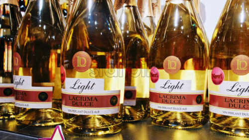 Video - CRICOVA, MOLDOVA - APRIL 6, 2021: White champagne bottles in the winery