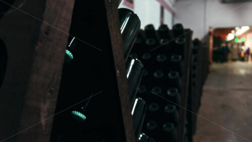 Video - Multiple wooden stands with wine bottles in Cricova winery, Moldova