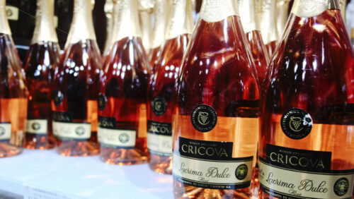 Video - CRICOVA, MOLDOVA - APRIL 6, 2021: Rose champagne bottles in the winery