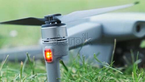 Video - Close-up shot of a drone lying on the grass