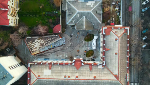 Video - Aerial drone view of ARTCOR Creative Center with people inside, bare trees. Moldova
