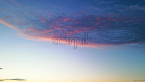 Video - View of the blue sky with colored clouds at sunset. Chisinau, Moldova