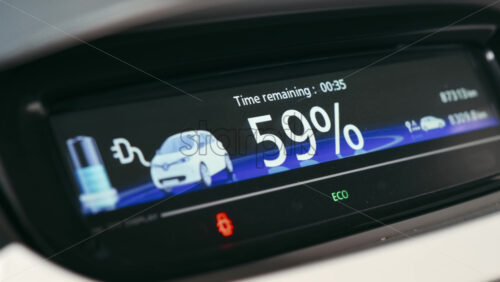 Video - CHISINAU, MOLDOVA - APRIL 26, 2021: Elecro car's display showing charging process