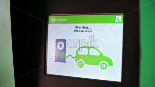 Video - CHISINAU, MOLDOVA - APRIL 26, 2021: Electric car main display showing charging process in percentage