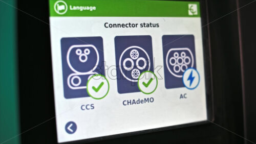 Video - CHISINAU, MOLDOVA - APRIL 26, 2021: Elecro car's charger display showing charging process