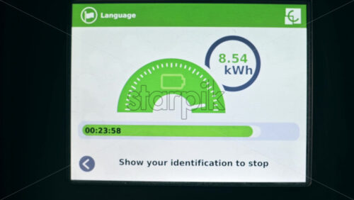 Video - CHISINAU, MOLDOVA - APRIL 26, 2021: Elecro car's charger display showing charging process
