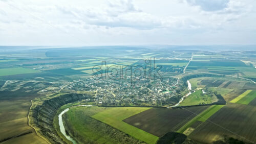 Video - Aerial drone hyperlapse of Orheiul Vechi landscape in early spring. Raut river. Moldova beauties landmarks