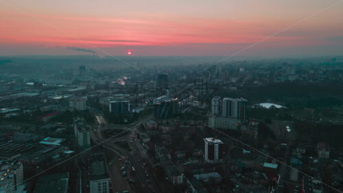 Video - Aerial drone hyperlapse timelapse sunrise above Chisinau city in Moldova.
