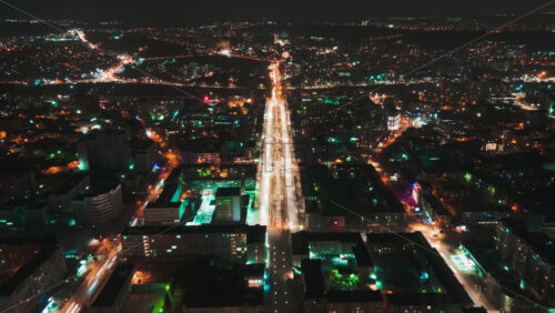 Video - Aerial drone hyperlapse timelapse of moving cars in the city at night. Chisinau, Moldova