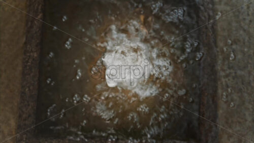 Video - Close up of a small water fountain in the Princess Grace Japanese Garden City park in Monaco