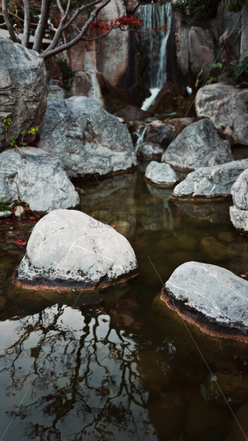 Video - View of the a small waterfall in the Japanese Gardens in Monaco