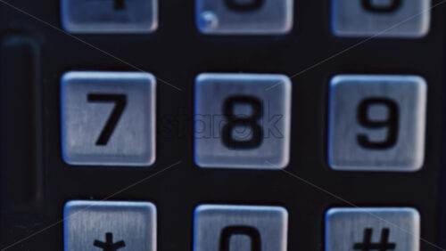 Video - Close up numbered buttons on a machine