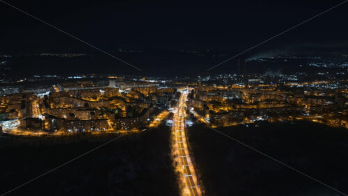 Video - Aerial drone hyperlapse timelapse of Chisinau city covered in snow at night. Winter in Moldova