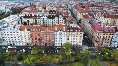 Video - Aerial drone view of Prague city with lots of buildings with red roofs. Czech Republic
