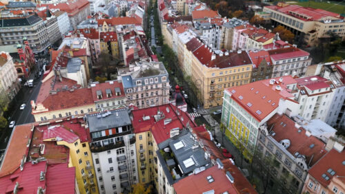 Video - Aerial drone view of Prague city with lots of buildings with red roofs. Czech Republic