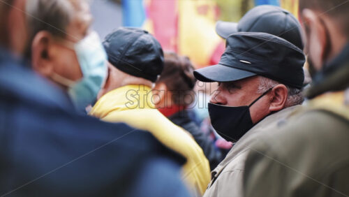Video - CHISINAU, MOLDOVA - APRIL 28, 2021: People protesting for snap elections in front of constitutional court building. Slow motion