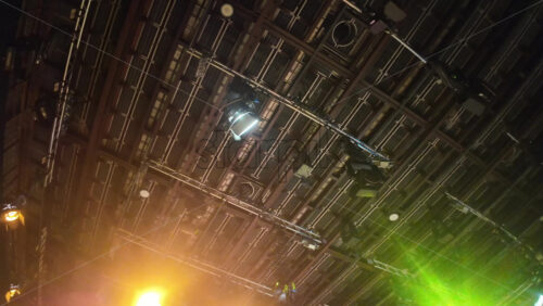 Video - Flashing studio lights equipment on the ceiling of a TV set
