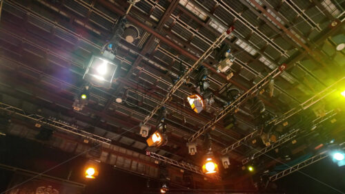 Video - Flashing studio lights equipment on the ceiling of a TV set
