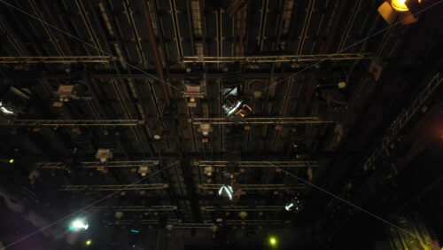 Video - Flashing studio lights equipment on the ceiling of a TV set