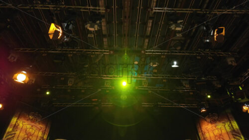 Video - Flashing studio lights equipment on the ceiling of a TV set