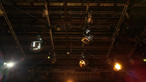 Video - Flashing studio lights equipment on the ceiling of a TV set