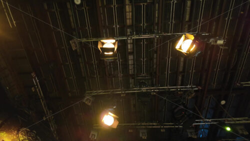 Video - Flashing studio lights equipment on the ceiling of a TV set