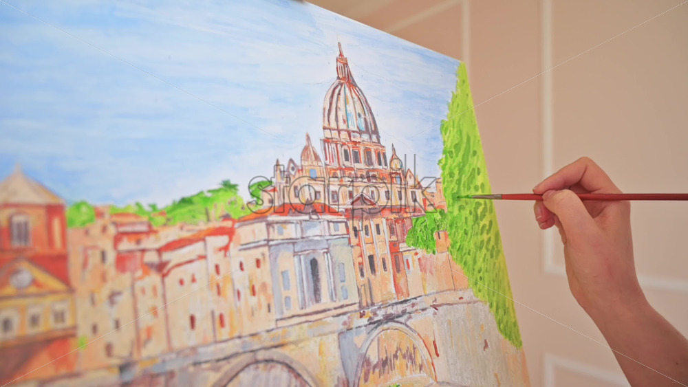 Video - Woman painting picture on the easel holding a palette. Home, slow motion