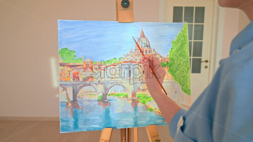 Video - Caucasian woman painting a picture indoors